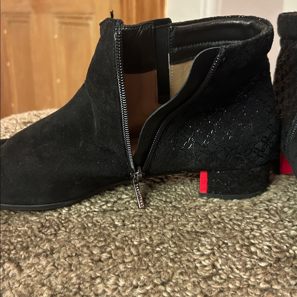 Ultra comfortable & stylish. Suede Ankle Bootwith inside-only red accent